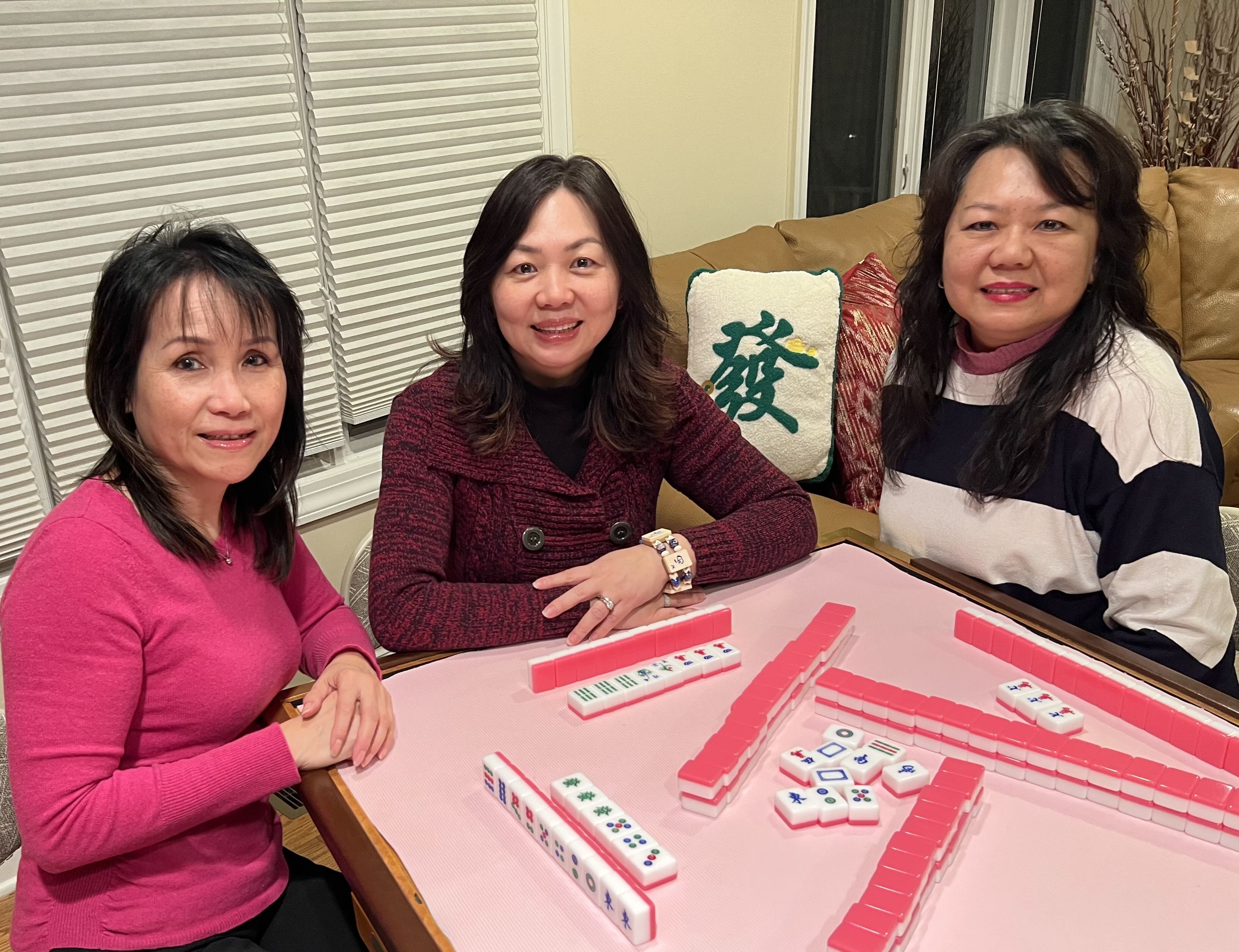 Pure Play Mahjong founders playing mahjong